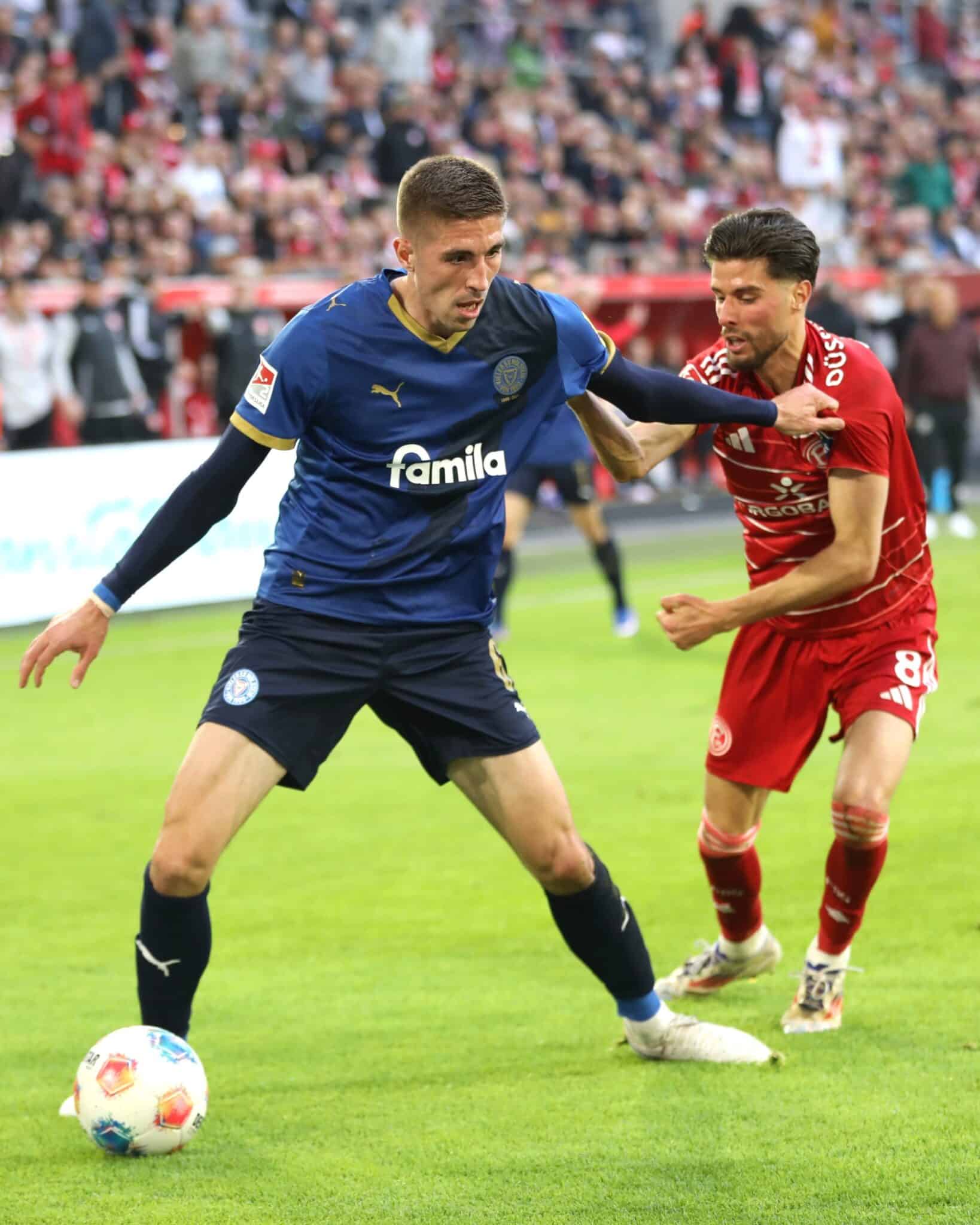 20260410 Düsseldorfs El Azzouzi gegen Kiels Ivezic 02